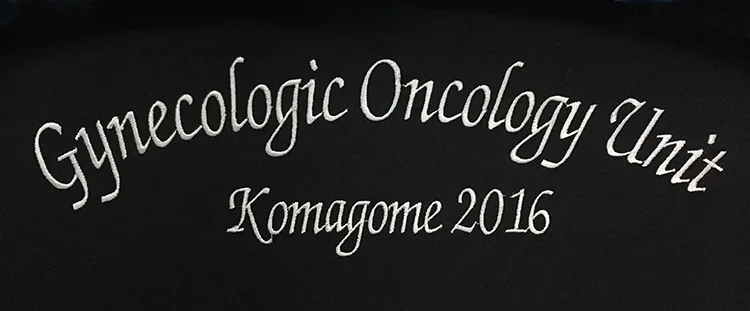 Gynecologic Oncology Unit のアーチ・グランバック刺繍。医療スクラブ・白衣に施した刺繍の実績