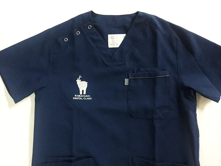 KOBAYASHI DENTAL CLINIC の刺繍（ディテール）