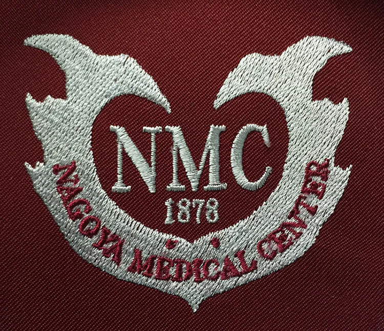 NAGOYA MEDICAL CENTER のオリジナルロゴ・研修医。医療スクラブ・白衣に施した刺繍の実績