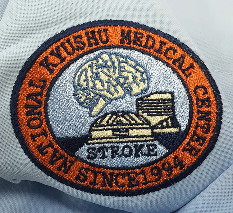 NATIONAL KYUSHU MEDICAL CENTER の刺繍（白衣・スクラブへの着用イメージ）