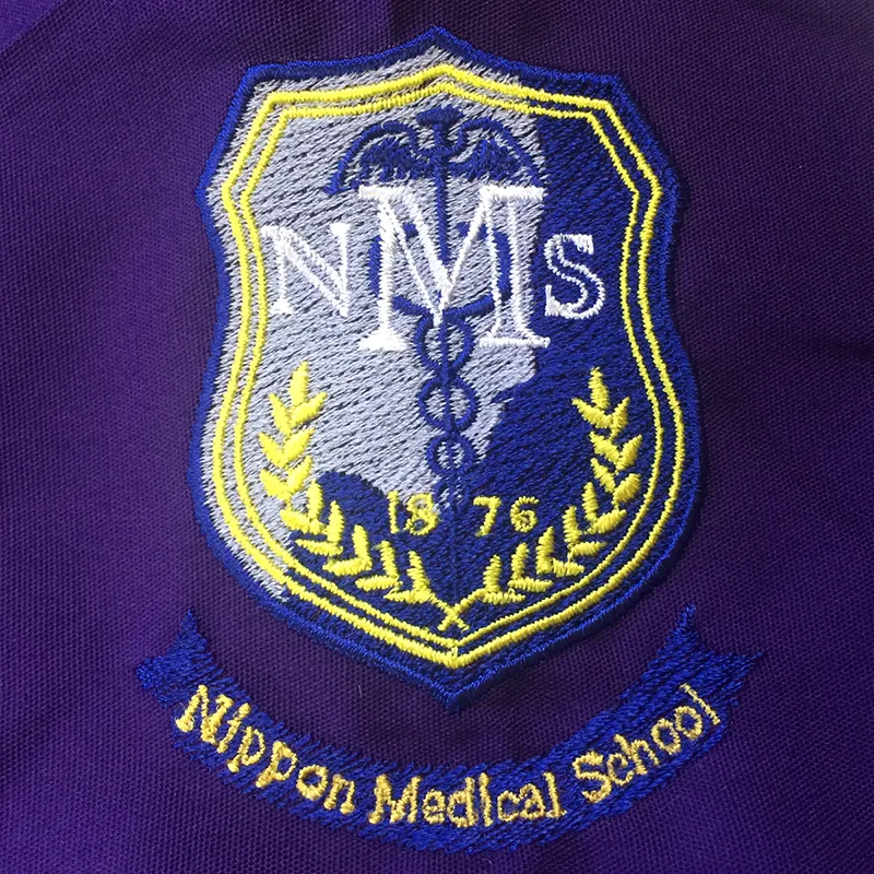 NMS / CHIBA HOKUSOH HOSPITAL Team Dental のエンブレム・校章。医療スクラブ・白衣に施した刺繍の実績