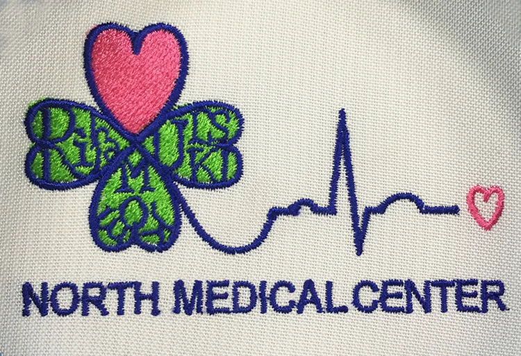 NORTH MEDICAL CENTER のオリジナルロゴ・ハート。医療スクラブ・白衣に施した刺繍の実績