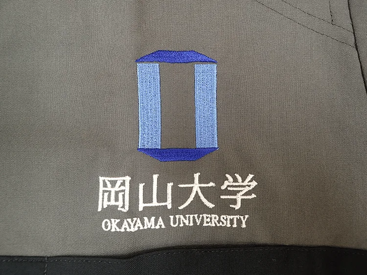 OKAYAMA GUT STUDY GROUP の刺繍（ディテール）