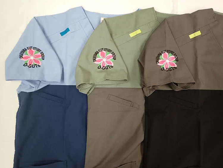 OKAYAMA GUT STUDY GROUP の刺繍（ディテール）