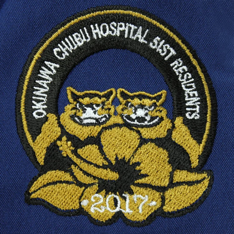 OKINAWA CHUBU HOSPITAL RESIDENTS 2017 のオリジナルロゴ・キャラクター。医療スクラブ・白衣に施した刺繍の実績