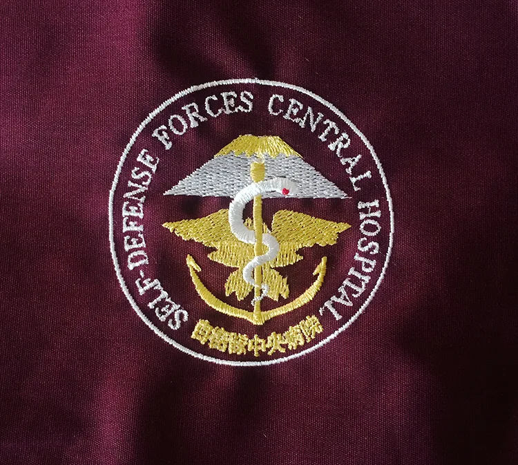 SELF-DEFENSE FORCES CENTRAL HOSPITAL のオリジナルロゴ・蛇。医療スクラブ・白衣に施した刺繍の実績