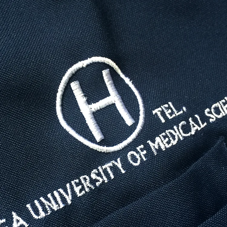 SHIGA UNIVERSITY OF MEDICAL SCIENCE の刺繍（白衣・スクラブへの着用イメージ）