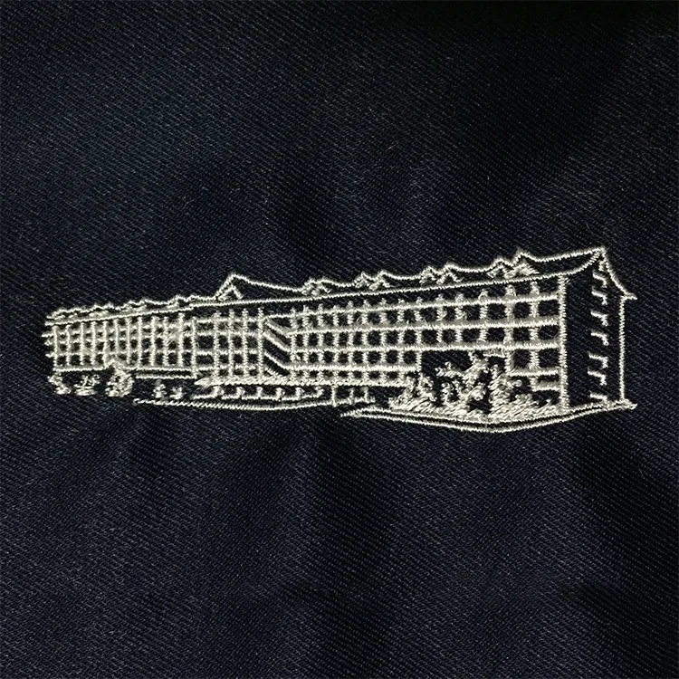 TENRI HOSPITAL のオリジナルロゴ・建物。医療スクラブ・白衣に施した刺繍の実績