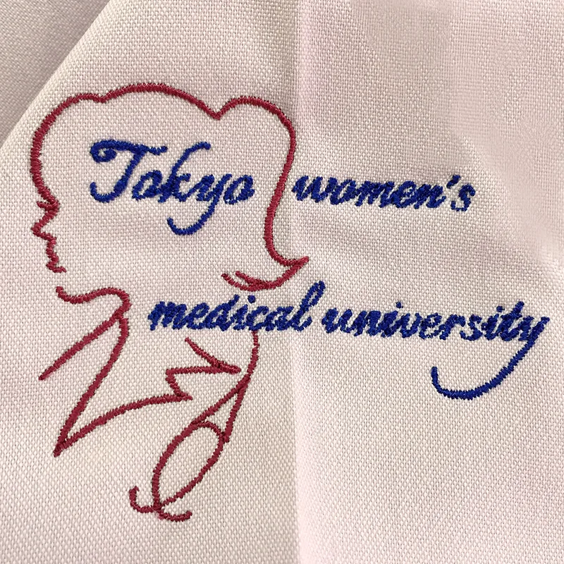 Tokyo women’s medical university のオリジナルロゴ・人物。医療スクラブ・白衣に施した刺繍の実績