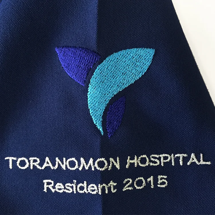 TORANOMON HOSPITAL Resident 2015 のオリジナルロゴ・研修医。医療スクラブ・白衣に施した刺繍の実績