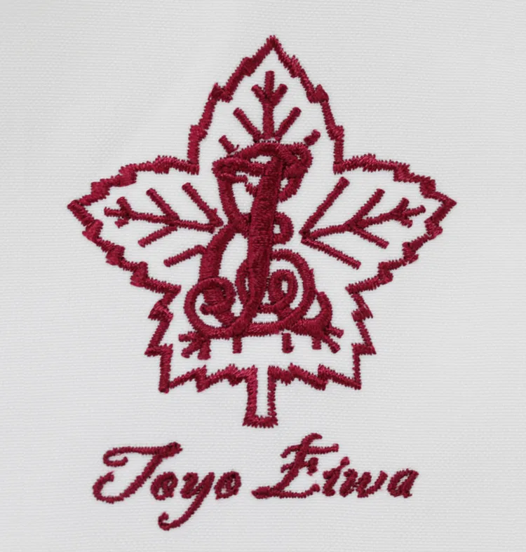 Toyo Eiwa の校章・草花。医療スクラブ・白衣に施した刺繍の実績