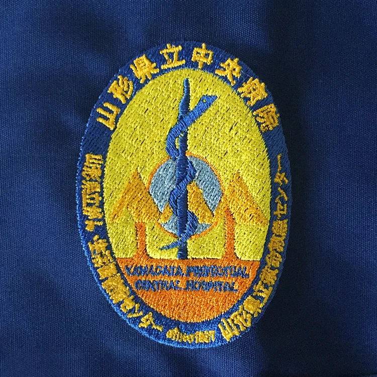 YAMAGATA PREFECTURAL CENTRAL HOSPITAL のエンブレム・蛇。医療スクラブ・白衣に施した刺繍の実績