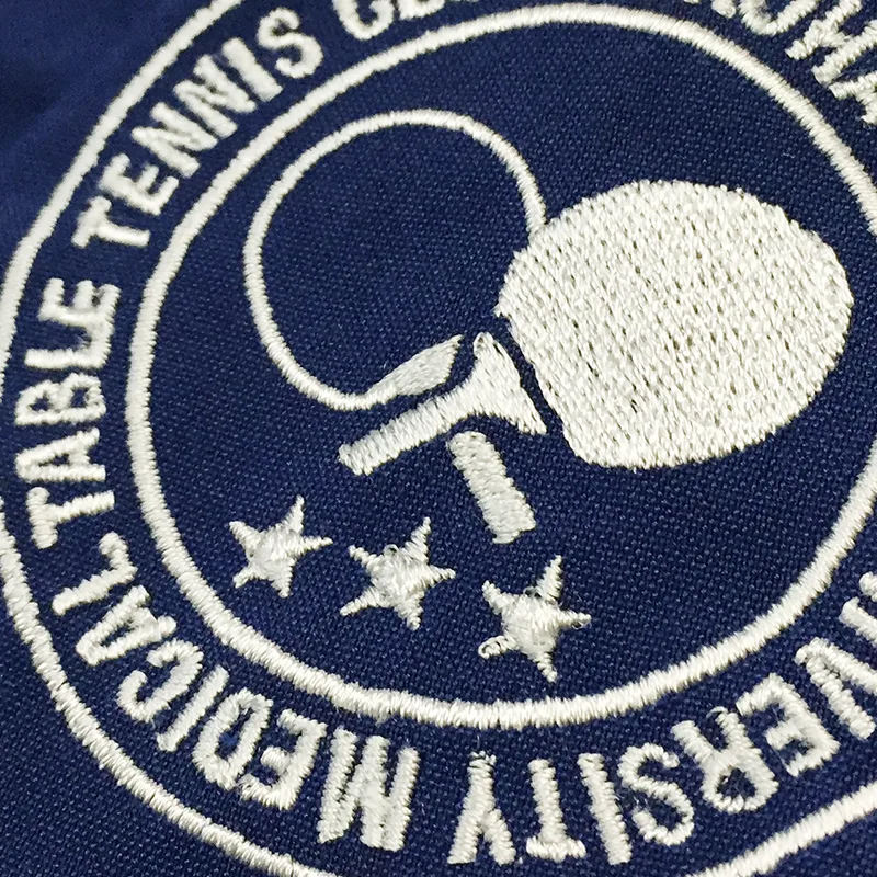YOKOHAMA CITY UNIVERSITY MEDICAL TABLE TENNIS CLUB の刺繍（白衣・スクラブへの着用イメージ）