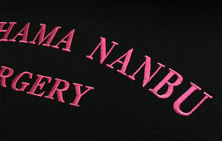 YOKOHAMA NUMBU SURGERY の刺繍（白衣・スクラブへの着用イメージ）